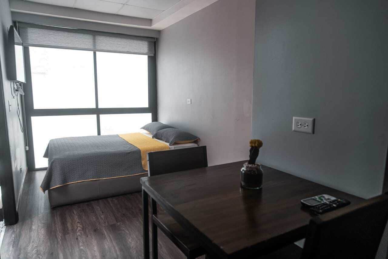 studio, 1 full bed, kitchen, city view (studio apartment) | 1 bedroom, pillow-top beds, blackout curtains, free wifi