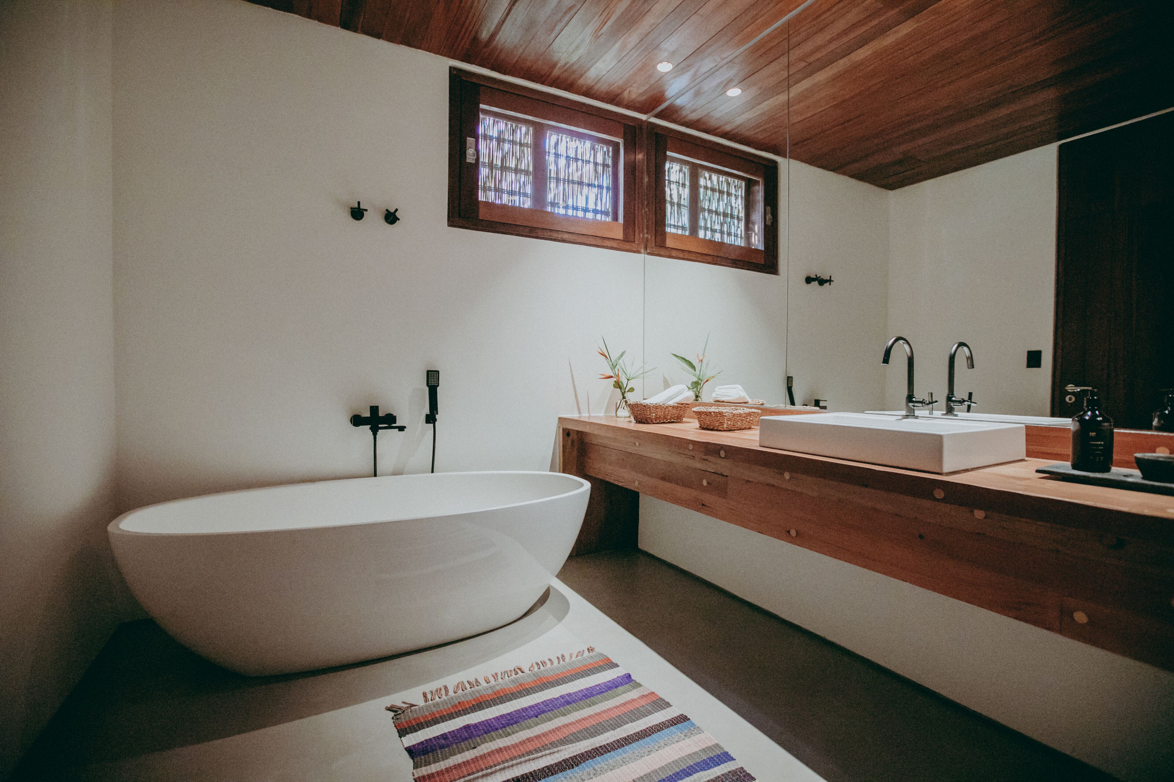 the corner suite | bathroom | designer toiletries, hair dryer, bathrobes, towels