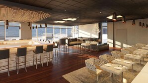 A modern bar area with a long counter, bar stools, and a seating area with patterned chairs and tables. - AC Hotel by Marriott Bridgewater (Bridgewater)
