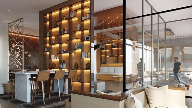 A modern interior with a bar area, seating, and a bookshelf. - AC Hotel by Marriott Bridgewater (Bridgewater)