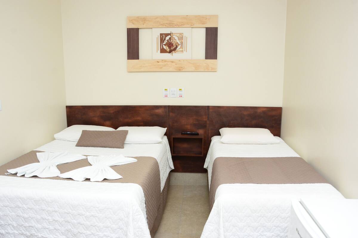 Triple Room | Minibar, desk, WiFi (free), bed sheets