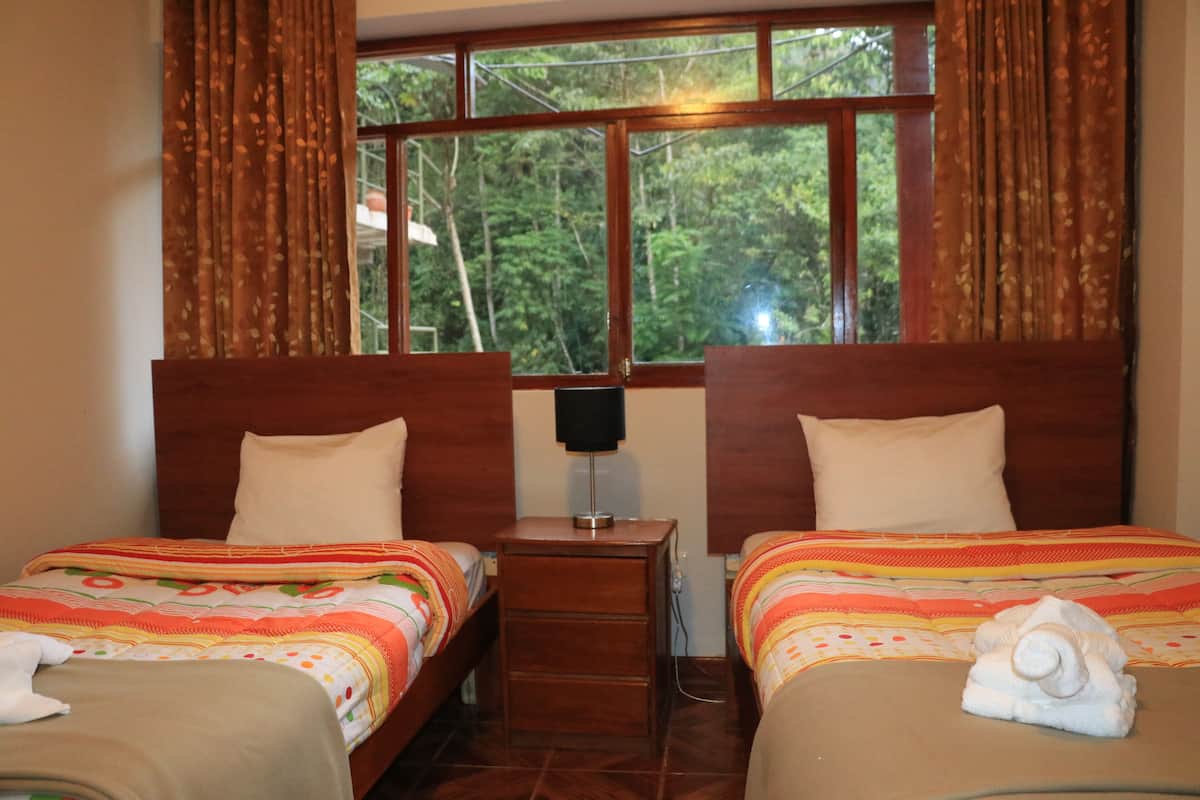 Iron/ironing board (on request), WiFi (free), bed sheets