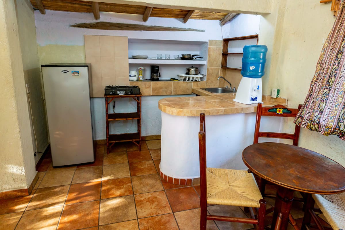 Economy Bungalow, 2 Bedrooms, Smoking, Kitchenette | Private kitchen | Full-size fridge, blender, cookware/dishes/utensils, cleaning supplies