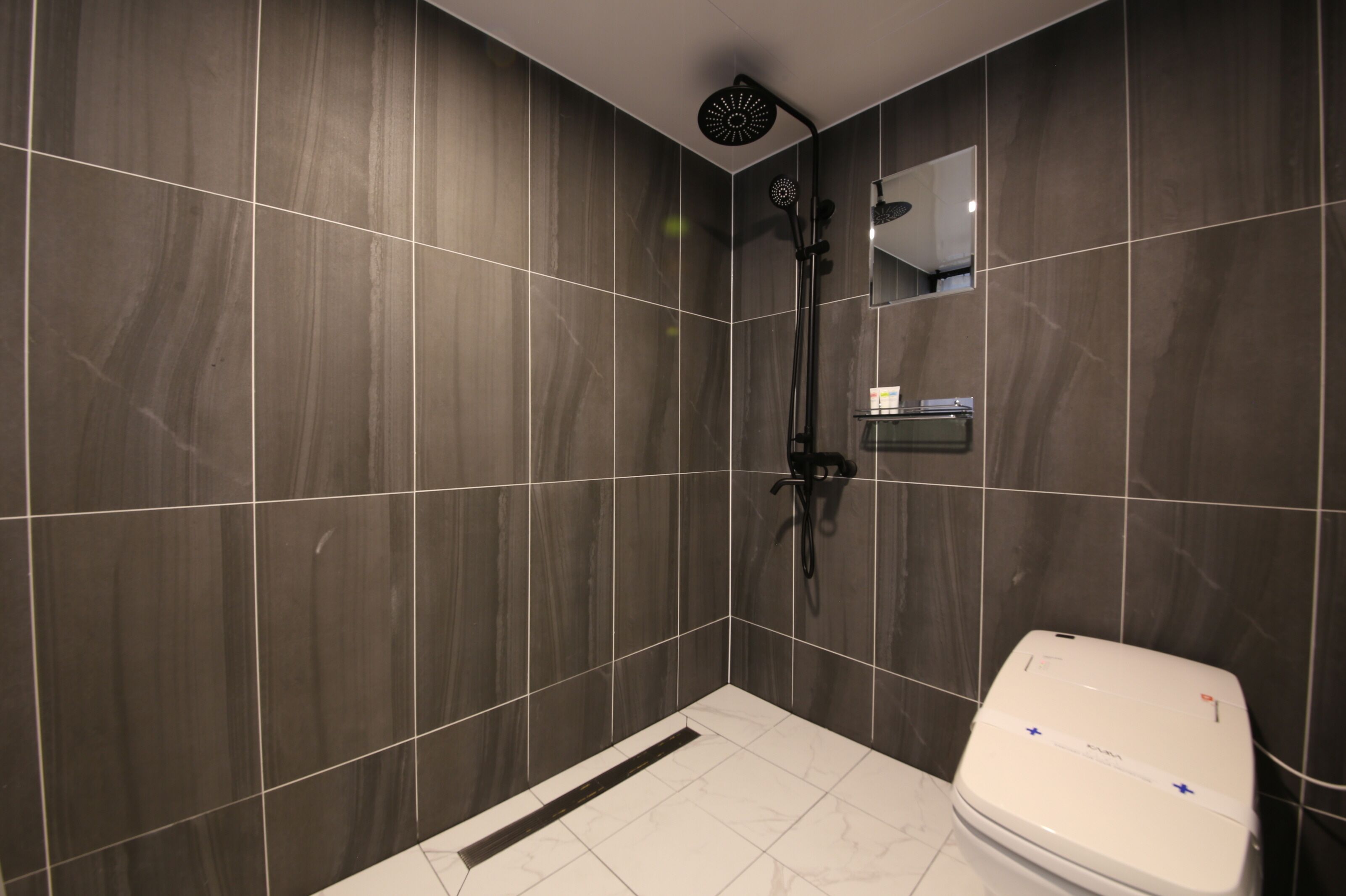 superior twin room | bathroom | free toiletries, hair dryer, bathrobes, slippers