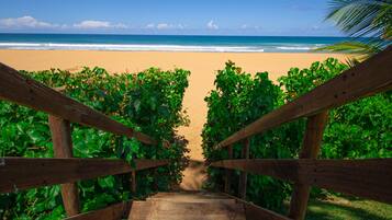 On the beach, sun-loungers, beach towels