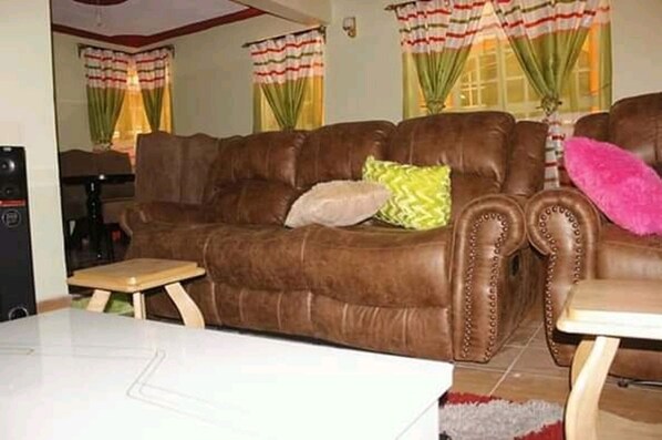 Apartment | Living area | 32-inch TV with digital channels - Wilbert Dreams Resort (Thika)