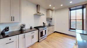 Fridge, microwave, stovetop, dishwasher - Water Street Unit C (Santa Fe)
