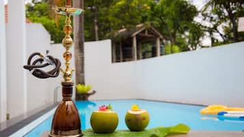 Outdoor pool, open 8:00 AM to 8:00 PM, sun loungers