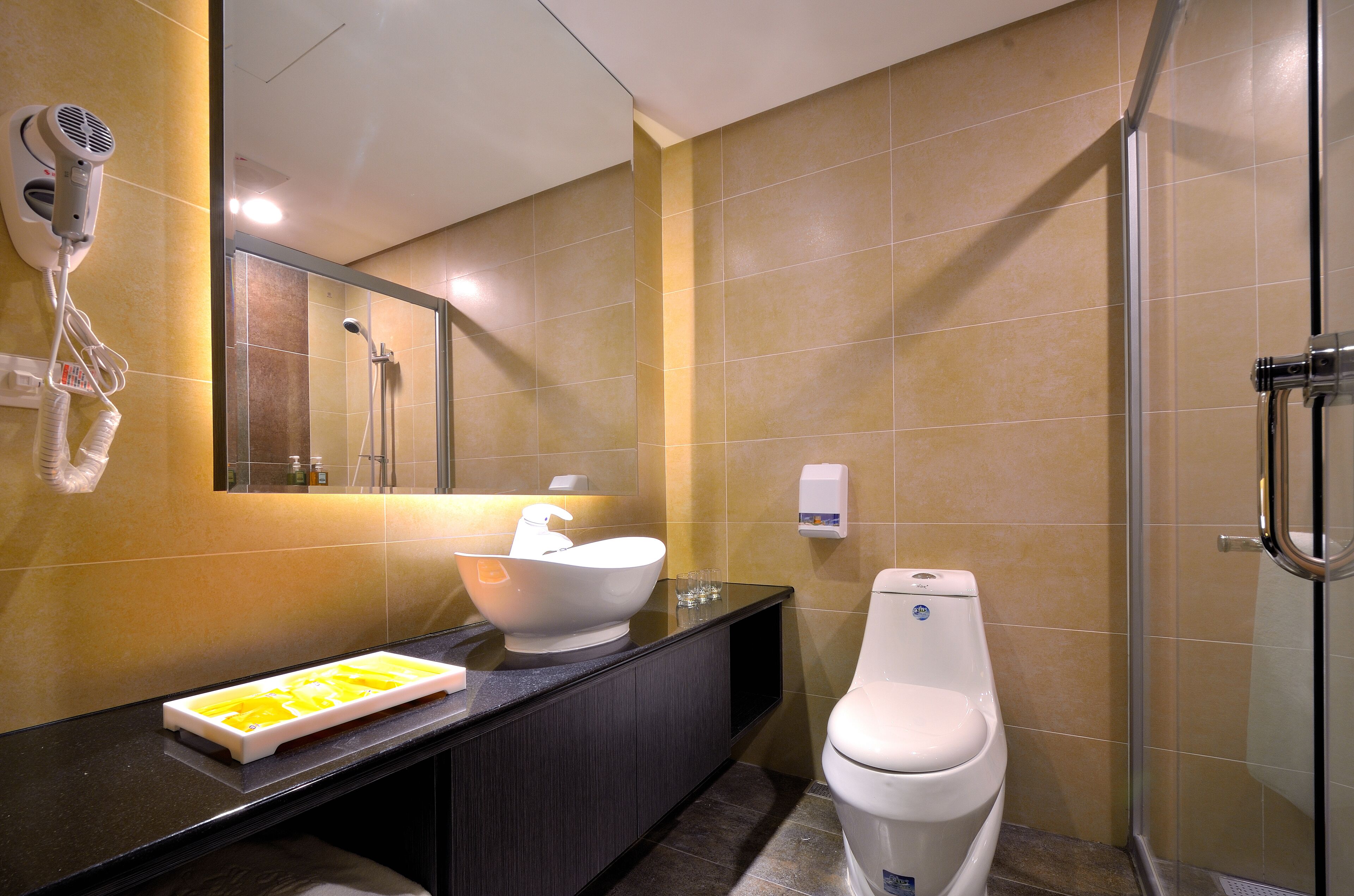 free toiletries, hair dryer, slippers, towels