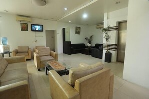 Flat-screen TV - OYO 1724 Hotel Sembilan Sembilan (Banjarmasin)