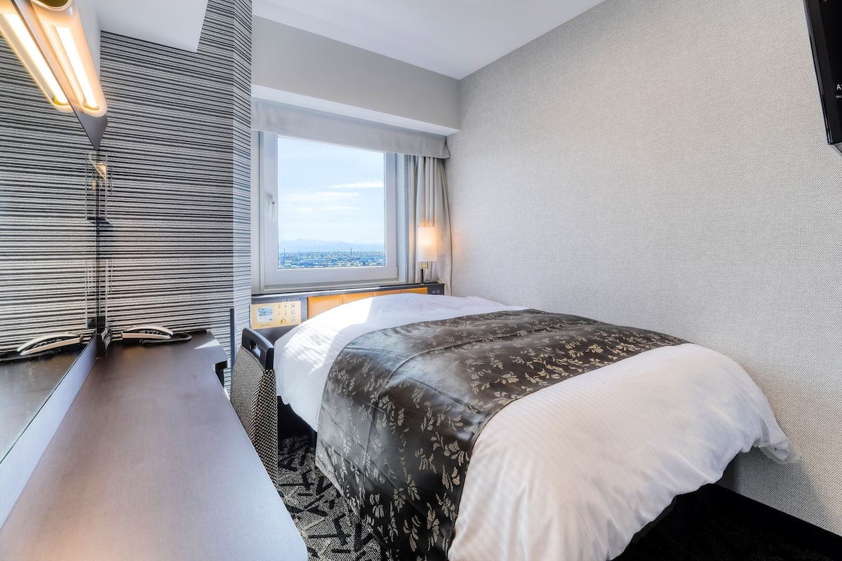 Standaard kamer (for Single Use) | Een bureau, verduisterende gordijnen, gratis wifi, beddengoed