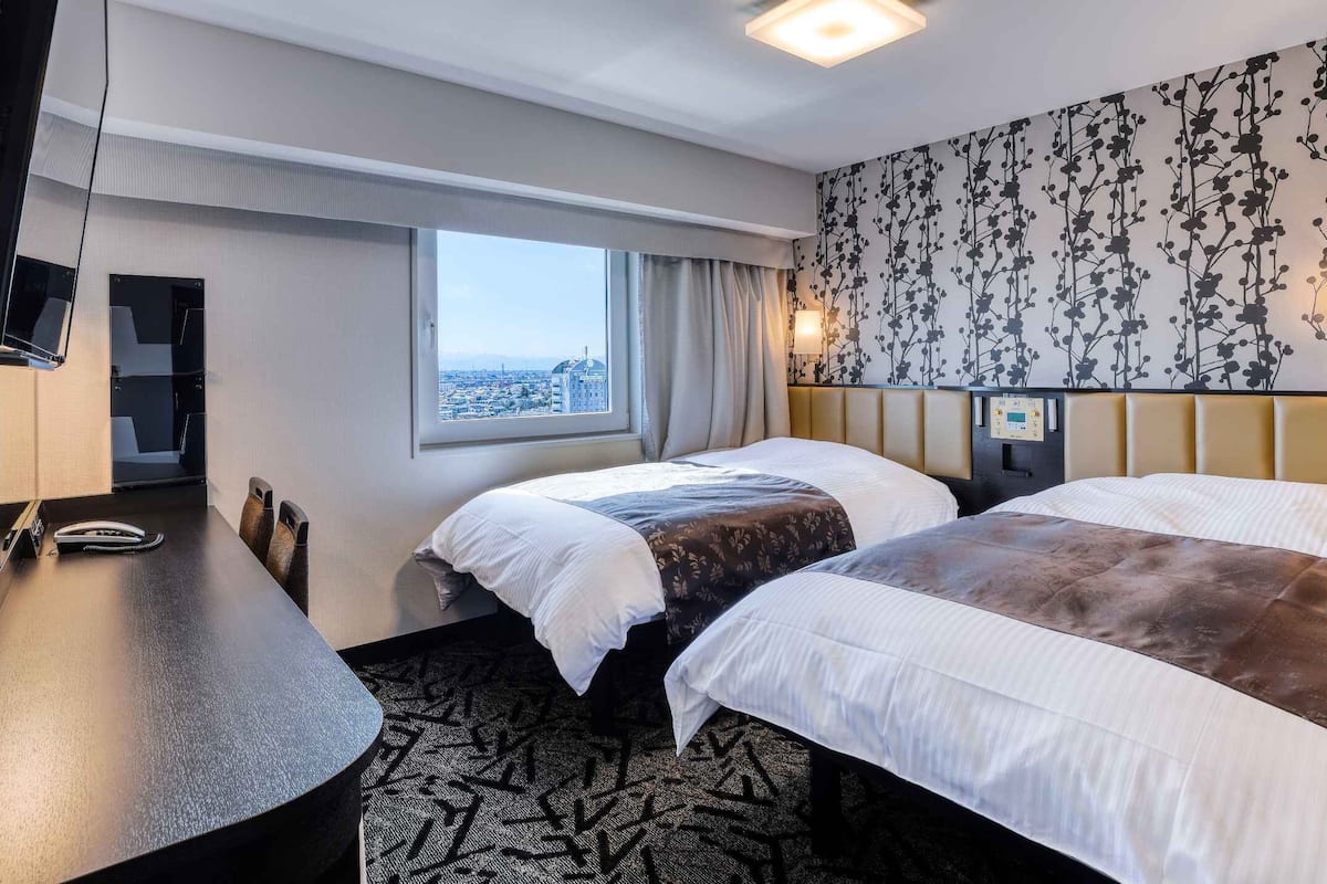 Desk, blackout drapes, WiFi (free), bed sheets
