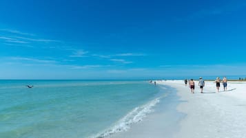 On the beach, sun loungers