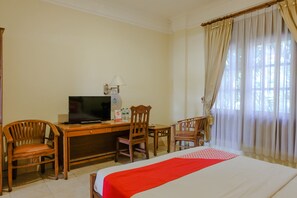 Suite Deluxe | Escritorio, espacio para trabajar con laptop y wifi gratis 