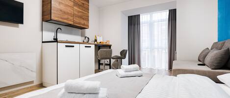 Superior Studio | Individually decorated, desk, soundproofing, iron/ironing board