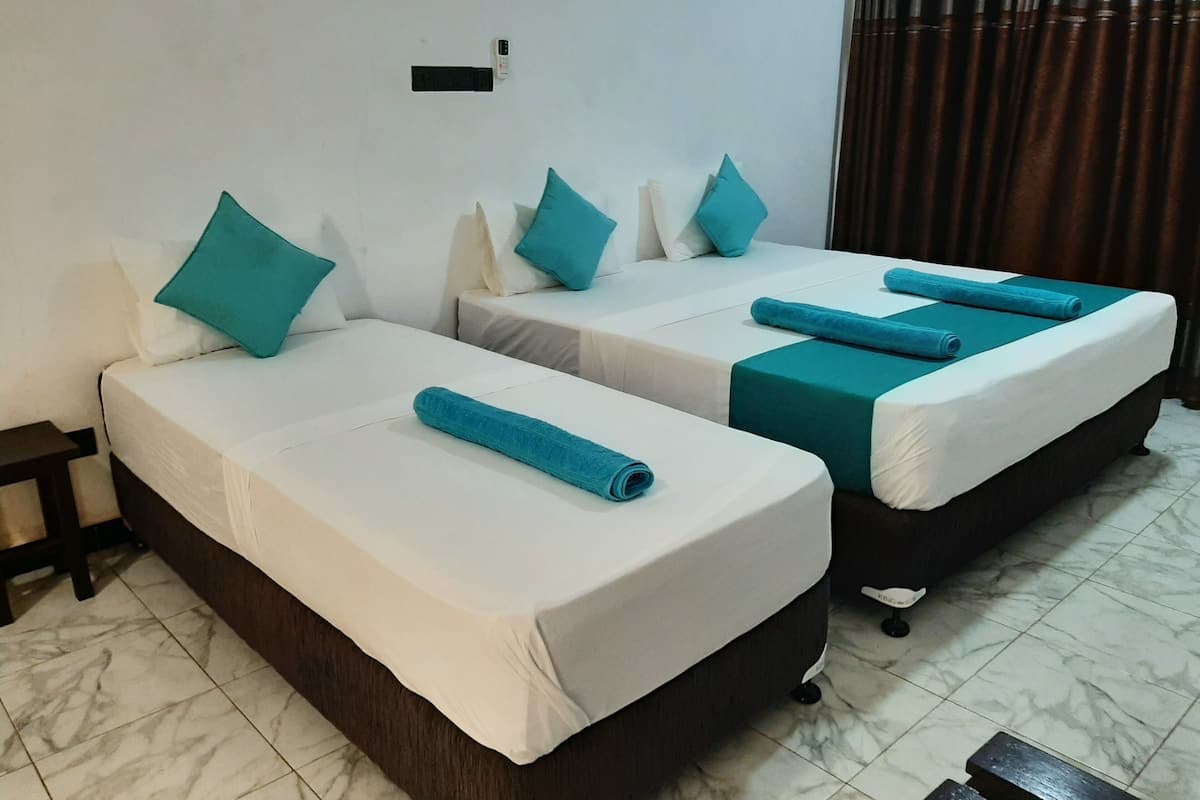 Standard Triple Room, 1 Bedroom | Premium bedding, down comforters, Select Comfort beds, in-room safe
