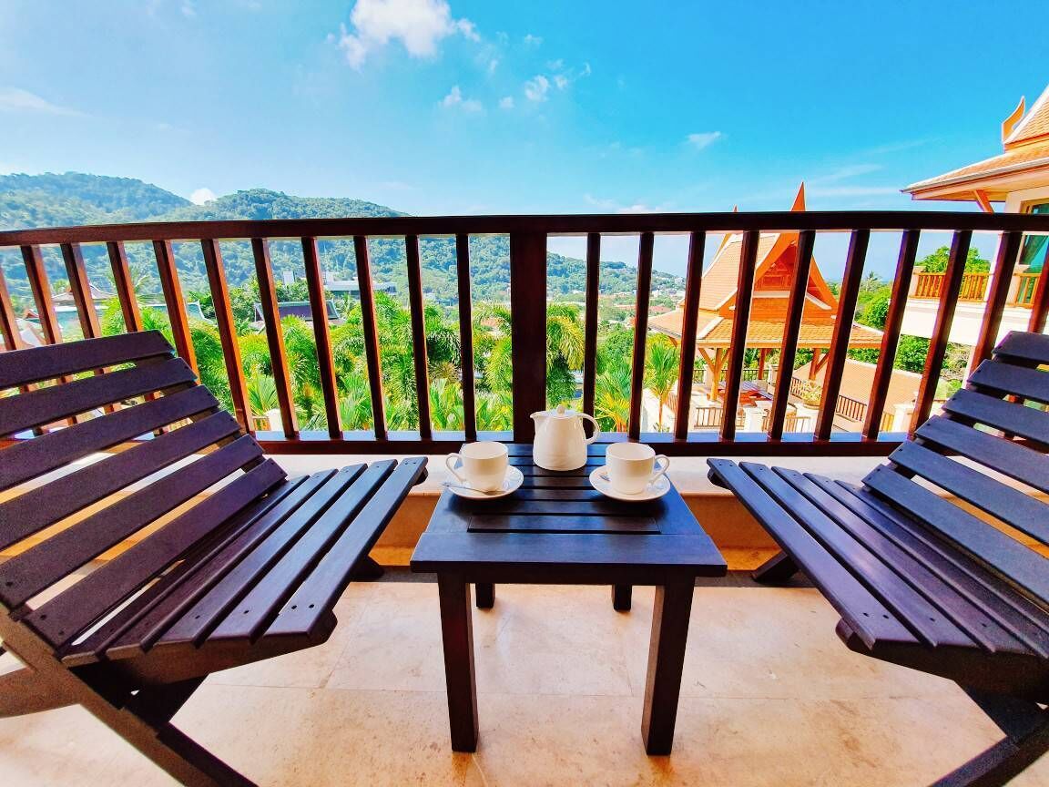 Deluxe Room with Pool View | Balcony view