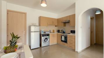 Apartment, 1 Bedroom | Private kitchen | Full-sized fridge, microwave, oven, coffee/tea maker