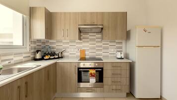 Penthouse, 2 Bedrooms | Private kitchen | Full-sized fridge, microwave, oven, coffee/tea maker