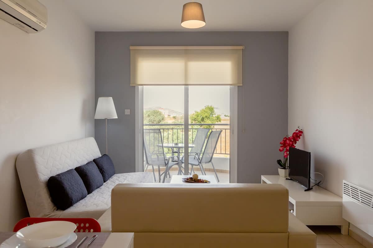 Apartment, 2 Bedrooms | Living room | Flat-screen TV