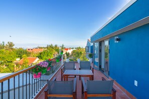 Neljän hengen deluxe-huone | Terassi/patio