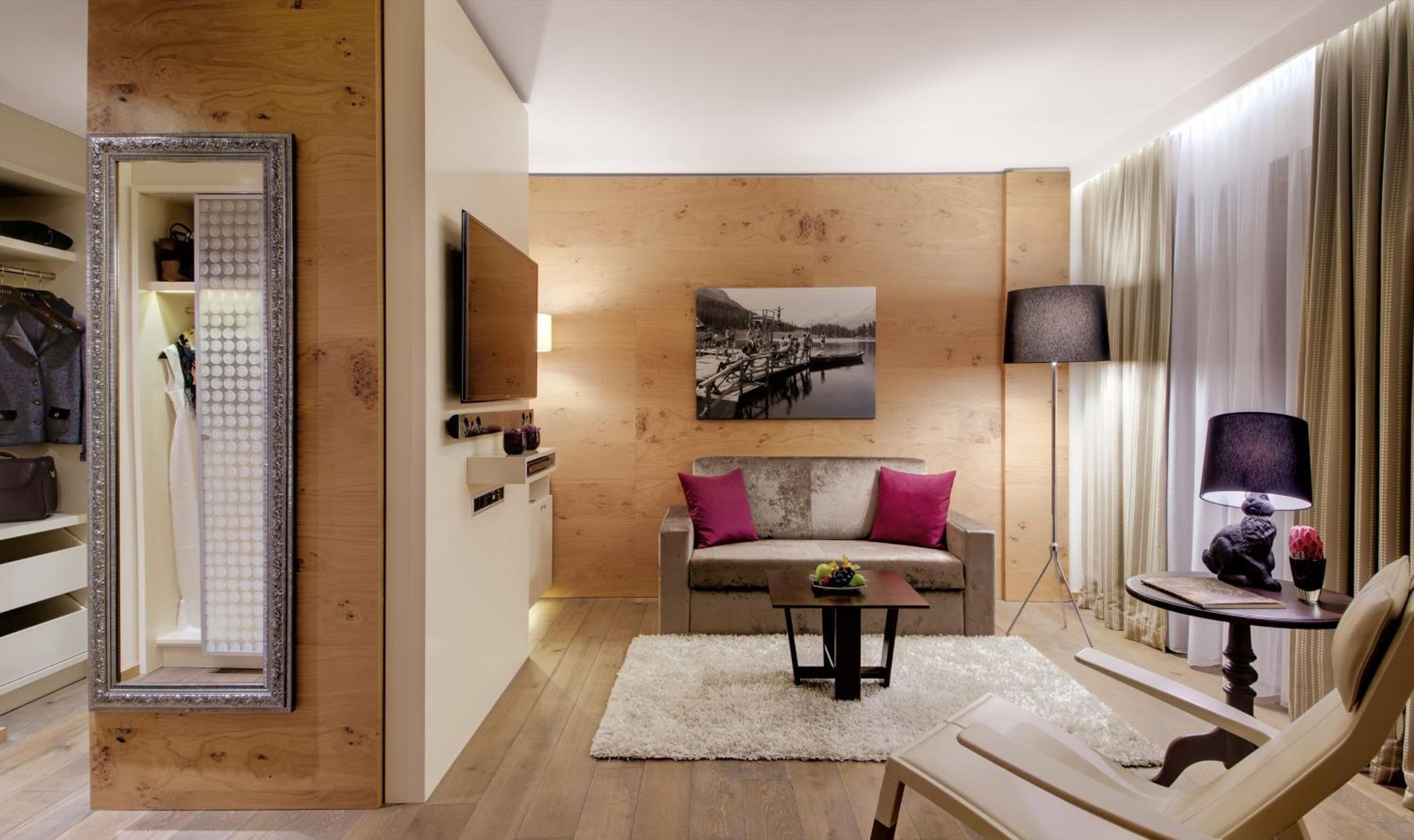 junior suite | living room | 32-inch flat-screen tv with digital channels, tv, dvd player