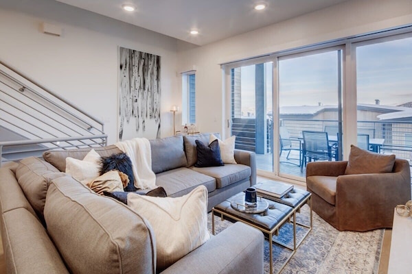 Living Room: Stylish space with panoramic views, plush seating, and sleek decor!