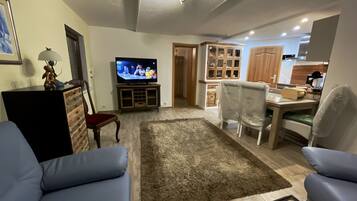 Comfort Condo, 1 Bedroom, Non Smoking (Romance) | Living area | TV