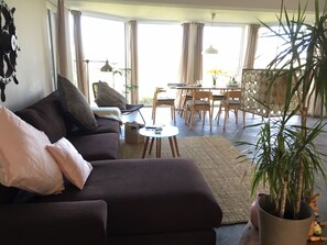 Apartment, 2 Bathrooms (Westwohnung) | Living area | 40-inch flat-screen TV with satellite channels, TV, computer - Beltblick (Fehmarn)