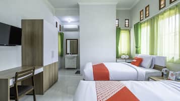 Habitación Deluxe con 2 camas individuales | Escritorio, wifi gratis, ropa de cama