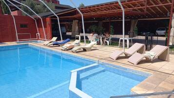 Alberca al aire libre por temporada