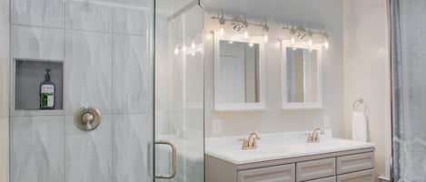 Bathtub, hair dryer, towels, soap