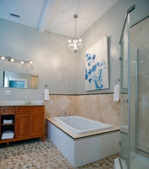 Bathtub, hair dryer, towels, soap