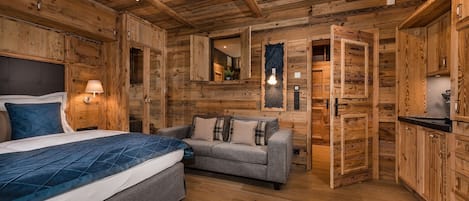 Chalet | Área de sala de estar | Televisión de pantalla plana y piso con calefacción