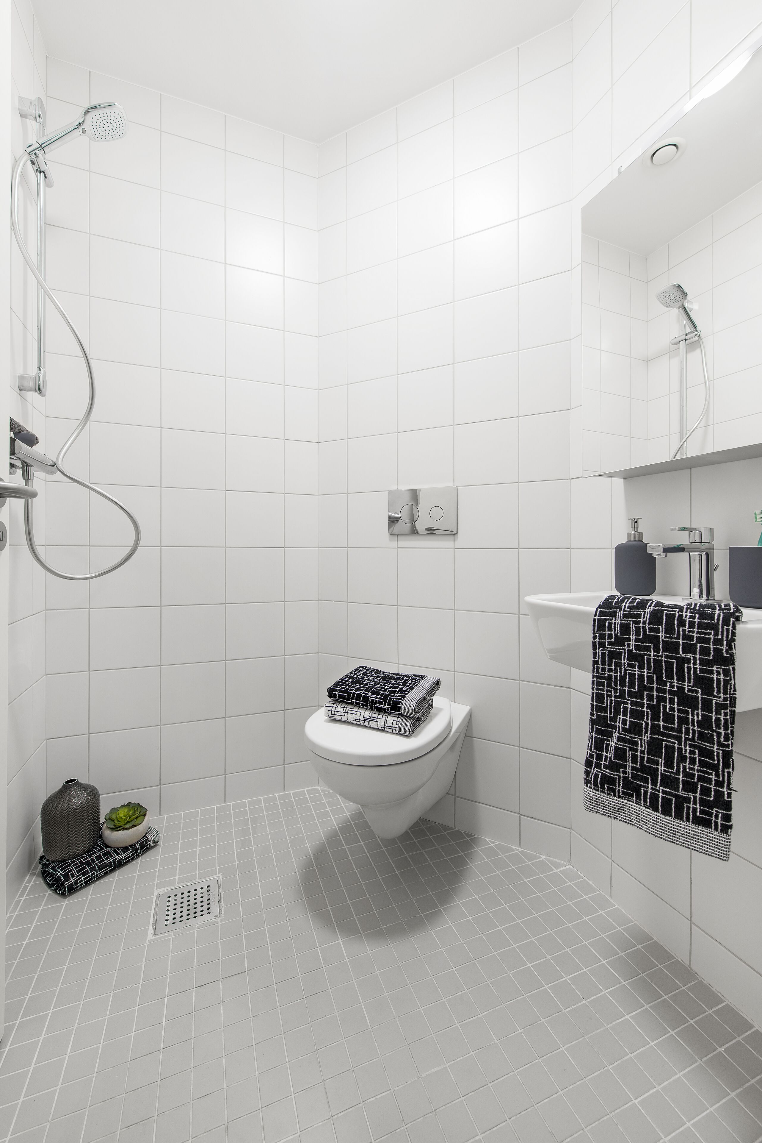Een douche, handdoeken