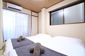 1 dormitorio, tabla de planchar con plancha, wifi gratis y ropa de cama