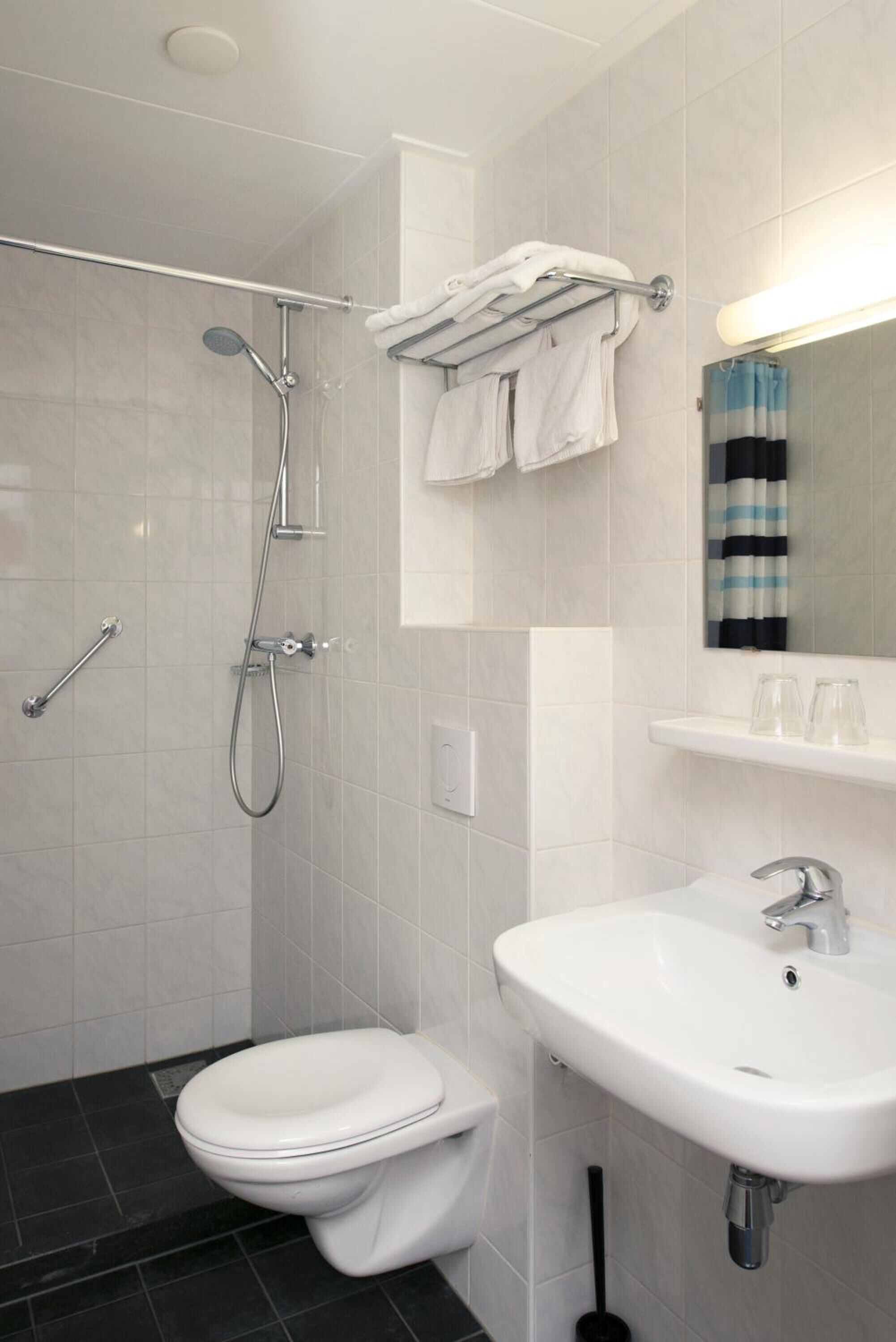 shower, free toiletries, towels, soap