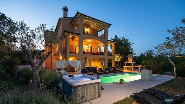 A two-story house with a swimming pool, hot tub, and outdoor seating area. - Spacious  holiday house - pool / jacuzzi / sauna / playground / 8+2 (Rakalj)