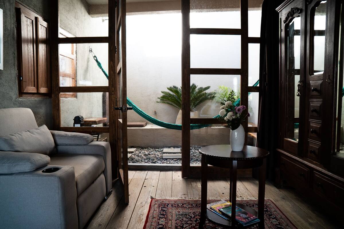 Honeymoon Room | Living room | Flat-screen TV, Netflix