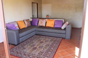 Apartment, 2 Bedrooms | Living room | 60-inch flat-screen TV with satellite channels, TV - Marina de plage (Allyene)
