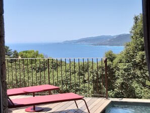 Habitación de lujo, acceso a la alberca, vista al mar | Terraza o patio