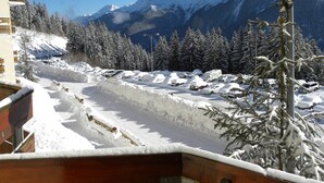 A snowy mountain landscape with a clear sky. - LE PLEYNET, LES 7 LAUX, studio cabin 4 people (Le Pleynet)