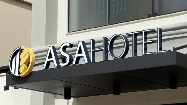 A hotel sign with the name 'ASA HOTEL' and a logo. - Asa Hotel (Piracicaba)