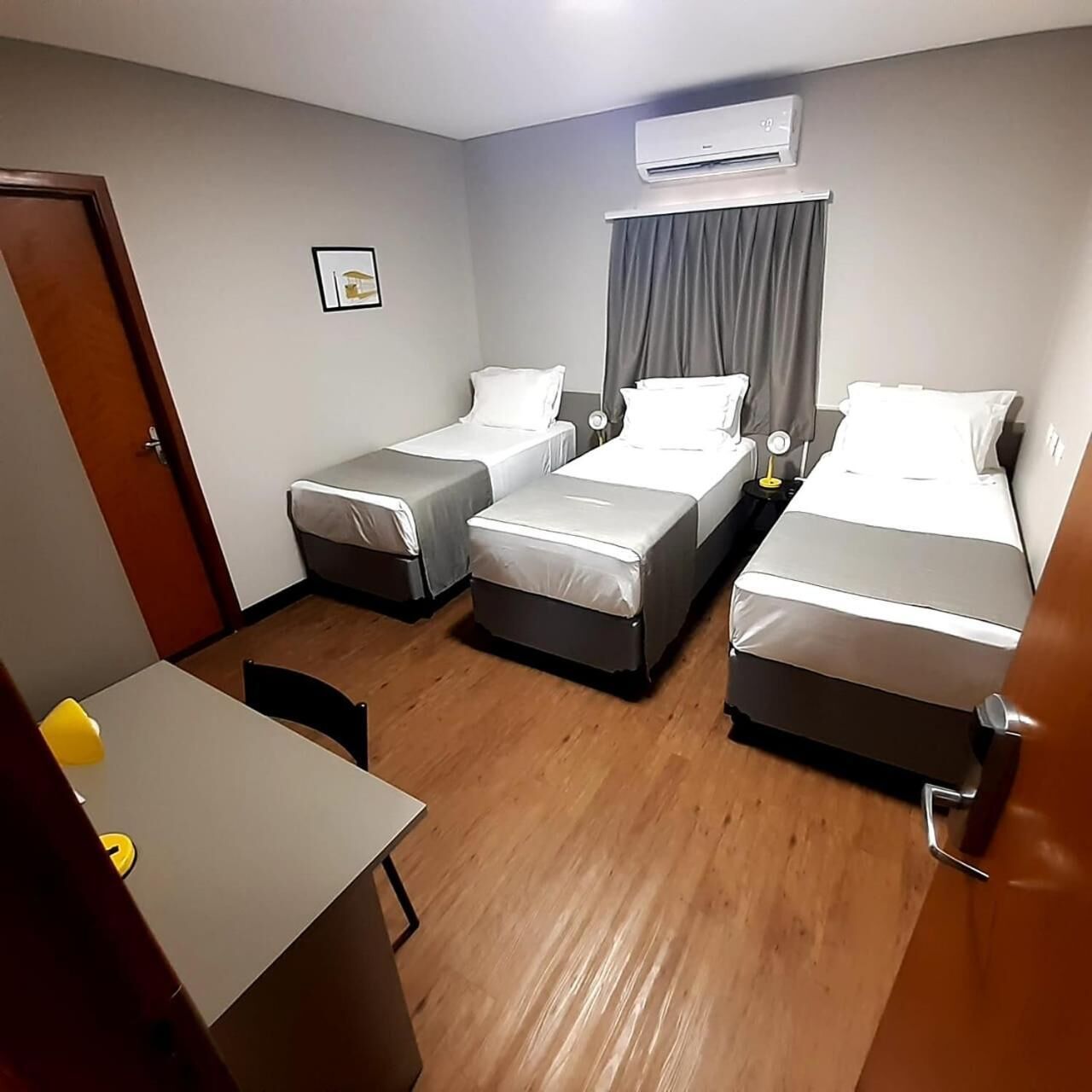 desk, laptop workspace, blackout curtains, free wifi