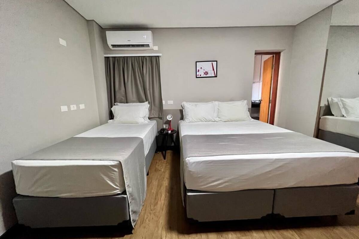 Family Triple Room | Desk, laptop workspace, blackout drapes, WiFi (free)