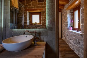 Bathtub, hair dryer, towels