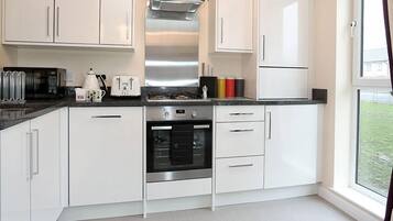 Apartment | Private kitchen | Fridge, microwave, oven, stovetop