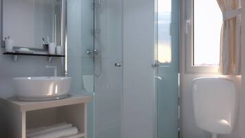 Mobile Home | Bathroom | Hair dryer, towels, soap, toilet paper