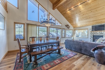 Dining Area - Seating for up to eight guests with 5 chairs and a bench. Dining area also provides access to the private balcony.