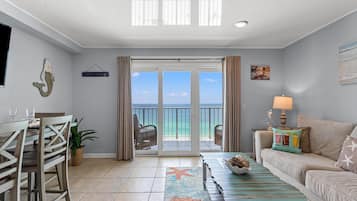 Condo, 1 King Bed with Sofa bed (The Summit 1409) | Living area | Flat-screen TV